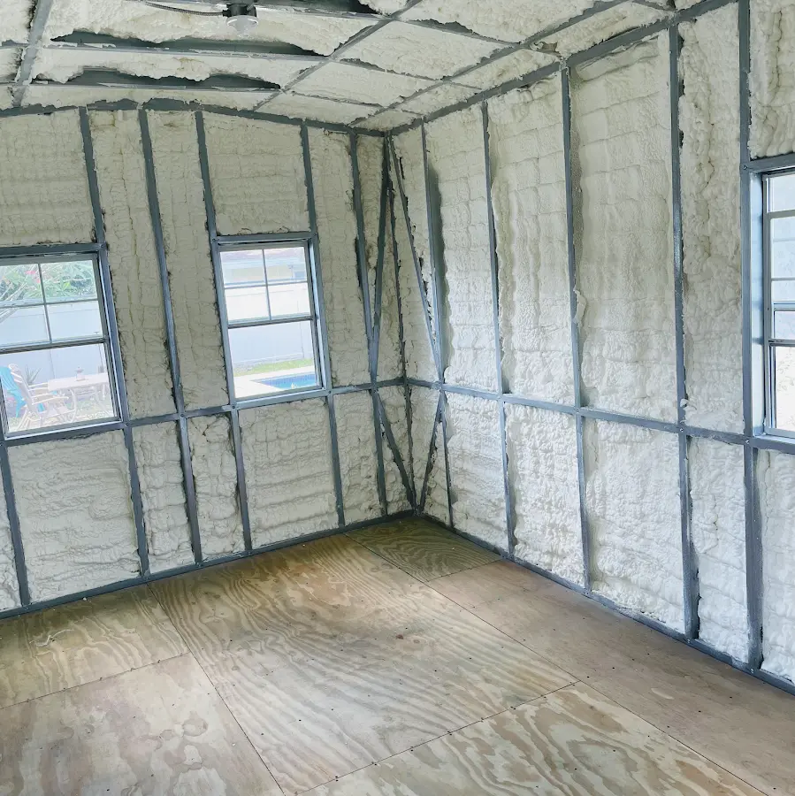 Closed-cell spray foam insulation applied to wall cavities in a residential project in Rhinebeck